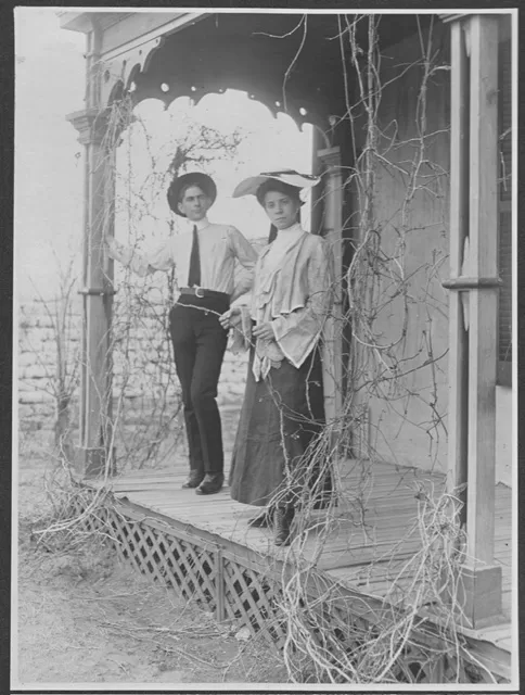 George and Ninette Miller standing on porch in Hillsboro NM c 1900